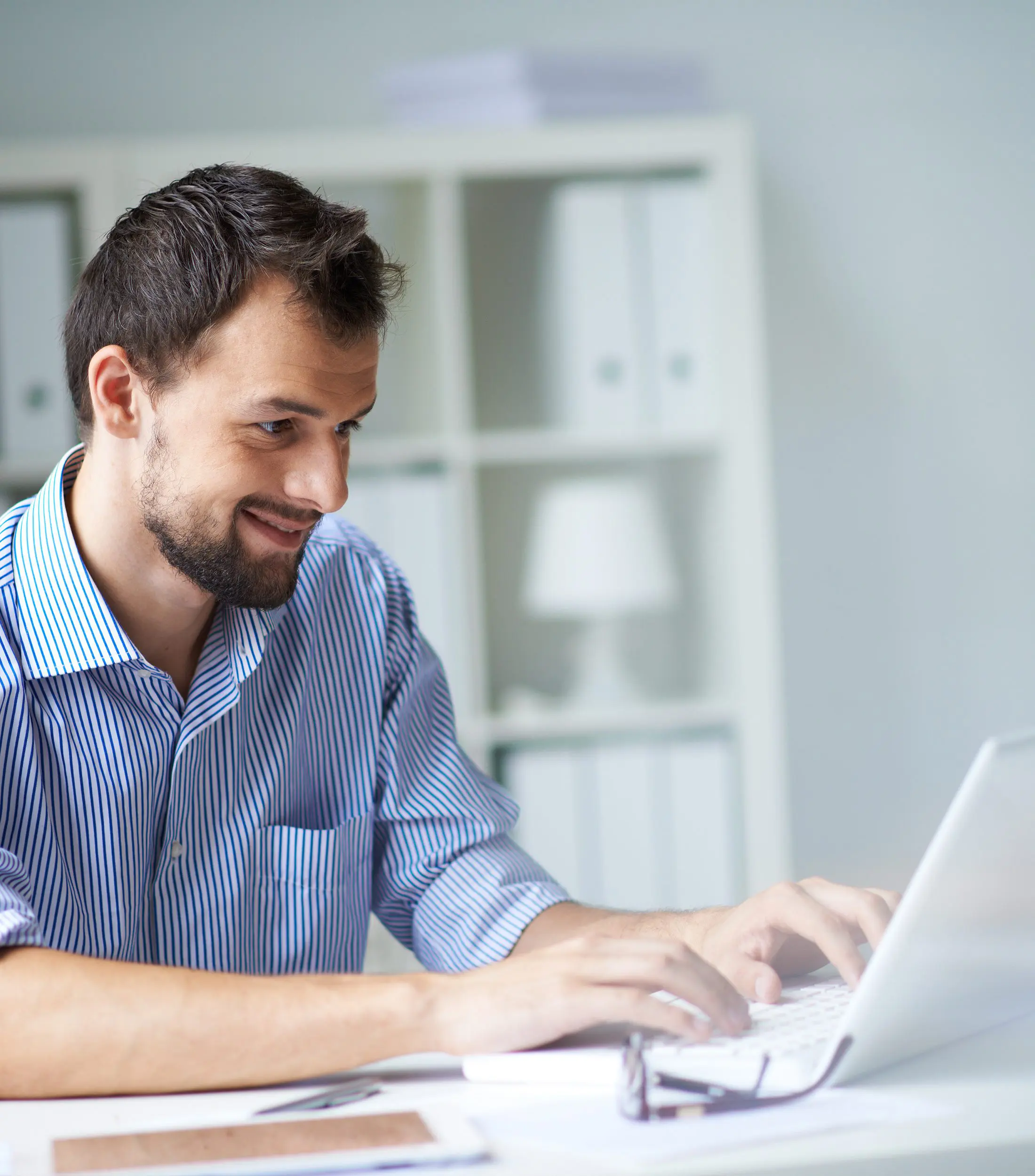 Businessman Working With Laptop in Office Important Information