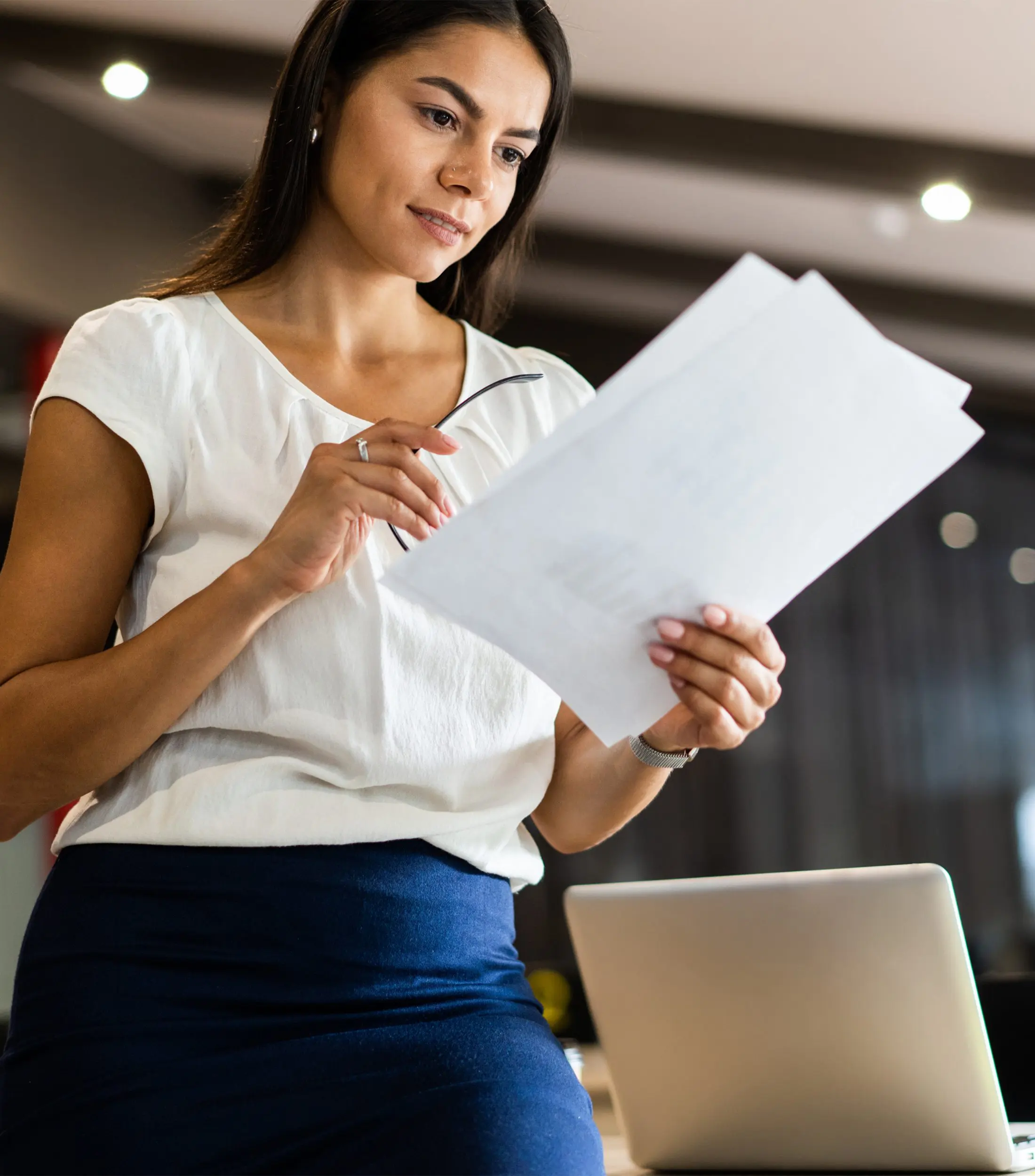 Woman Looking for the Right Document