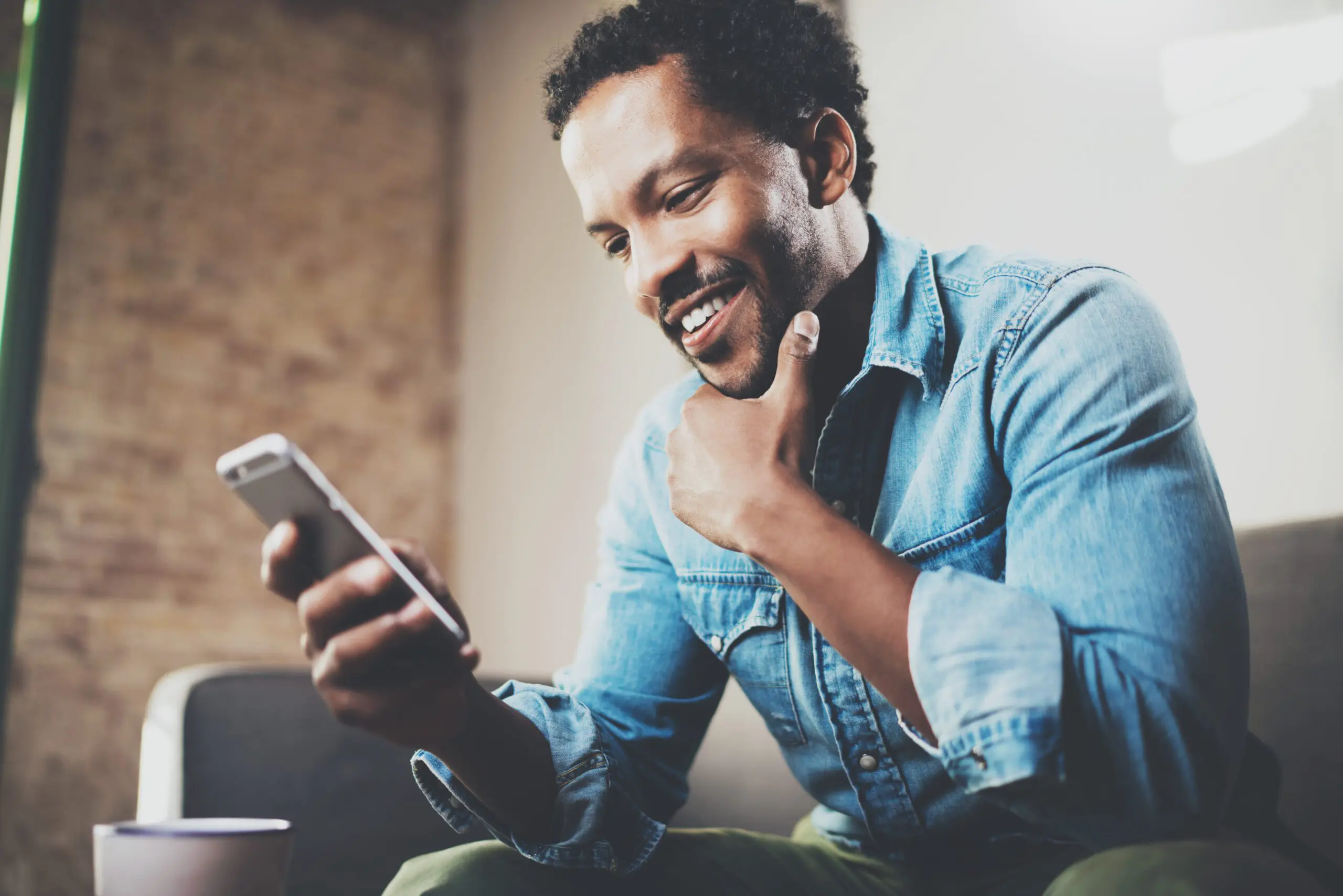 Man looking at a phone screen