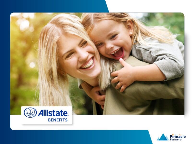 Family with smiling and giggling with child on the back
