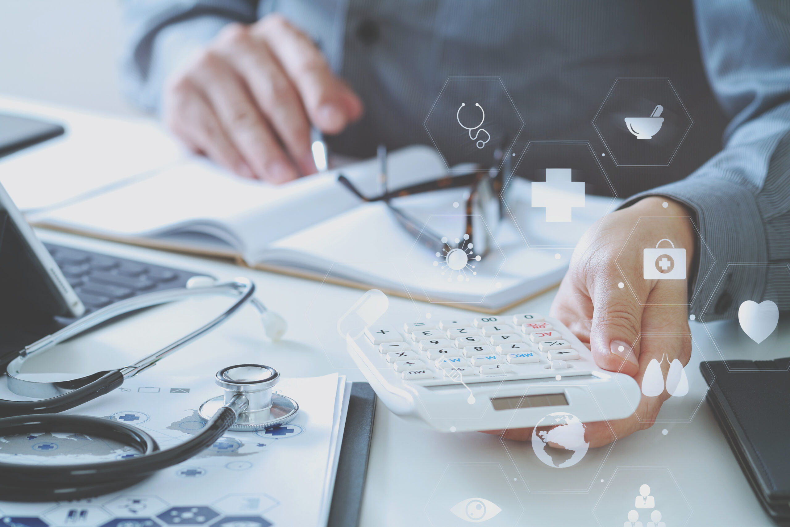 Healthcare costs and fees concept.Hand of smart doctor used a ca
