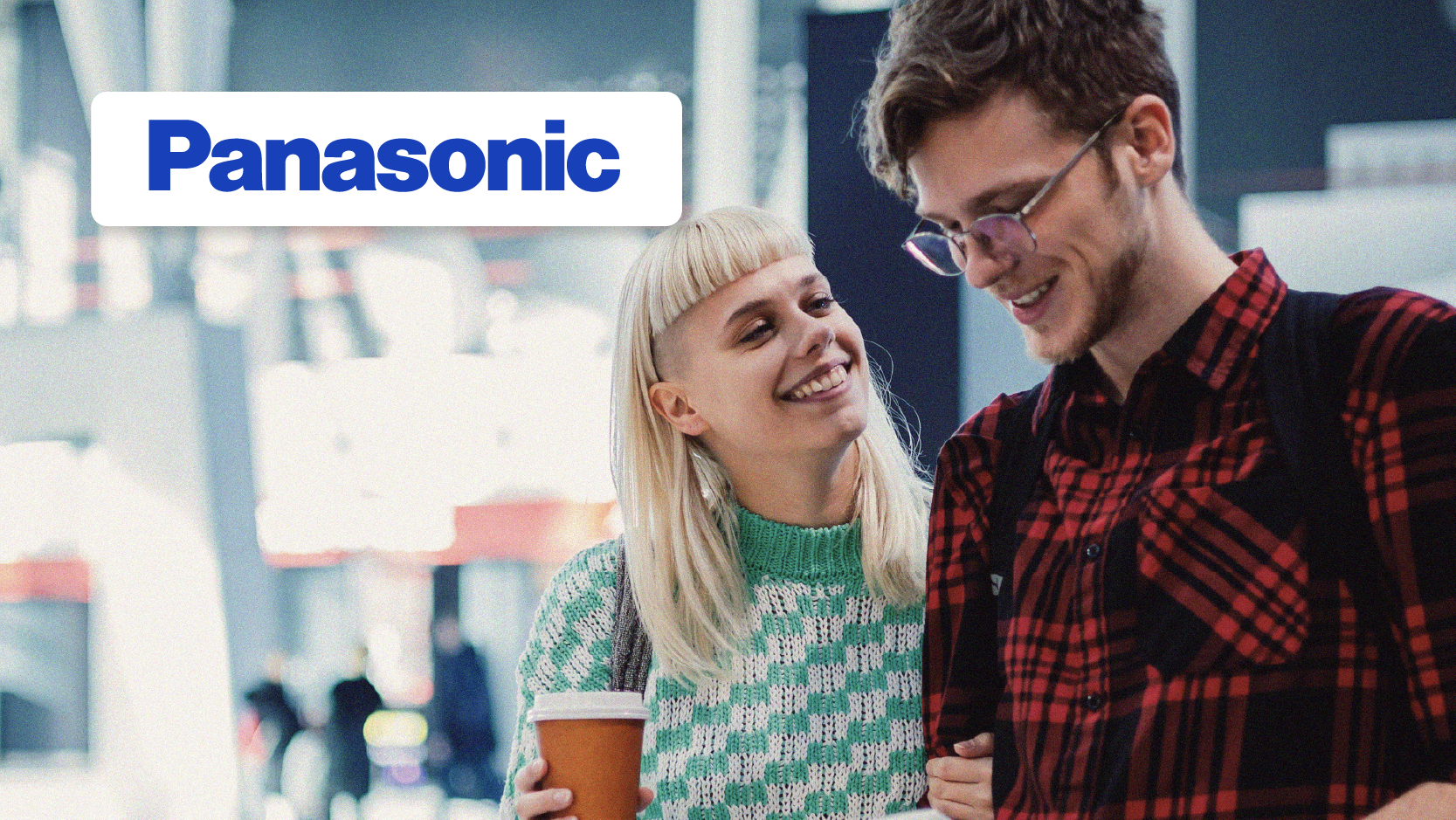 two gen z people happy with panasonic logo